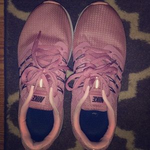 Pink nike running shoes